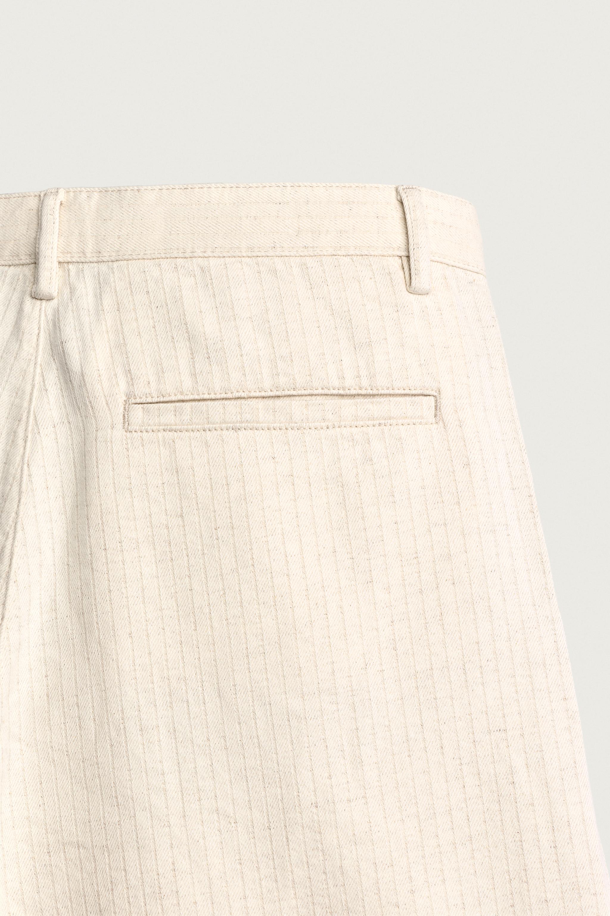 WIDE FIT STRIPED PLEATED SHORTS